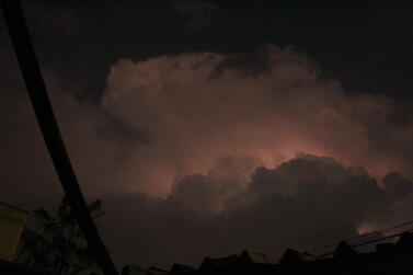 Lighting behind a cloud